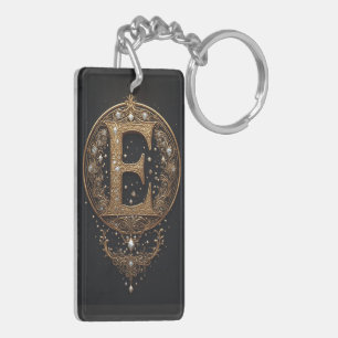 Gouden letter E met edelstenen barokke versiering Sleutelhanger