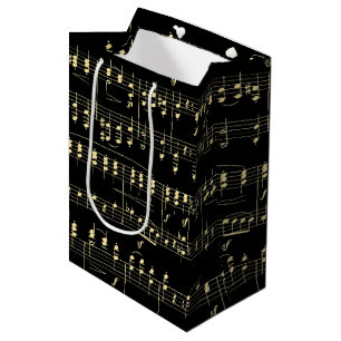 Gouden muziek op zwart medium cadeauzakje
