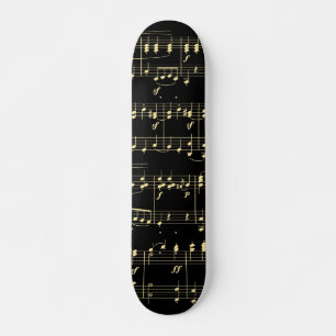 Gouden muziek op zwart skateboard