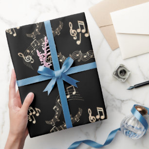 Gouden muzieknoten op zwarte achtergrond cadeaupapier