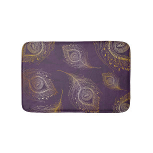 Gouden pauwenveer, violette achtergrond. badmat