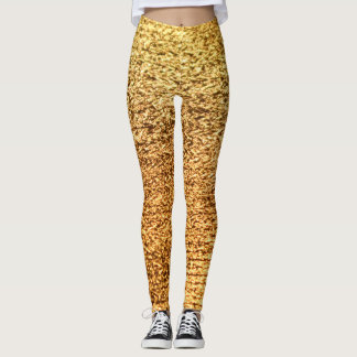 Gouden textiel: glamoureuze macro achtergrond. leggings