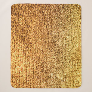 Gouden textiel: glamoureuze macro achtergrond. sherpa deken