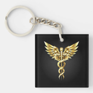 Gouden veelhoekig symbool Caduceus Sleutelhanger