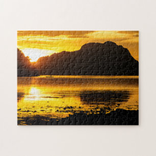 Gouden zonsondergang over de baai legpuzzel