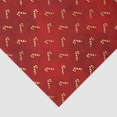 Goudkerstsnoerrietjes op rood tissuepapier (Detail)