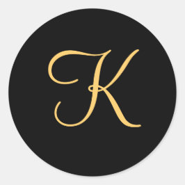 Goudkleurig initiaal K op de zwarte monogram stick Ronde Sticker