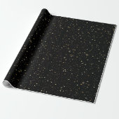 Goudtomegulter en sparkles op zwart cadeaupapier (Uitgerold)
