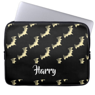Goudvlekken op zwart laptop sleeve