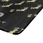 Goudvlekken op zwart snijplank (Hoek)