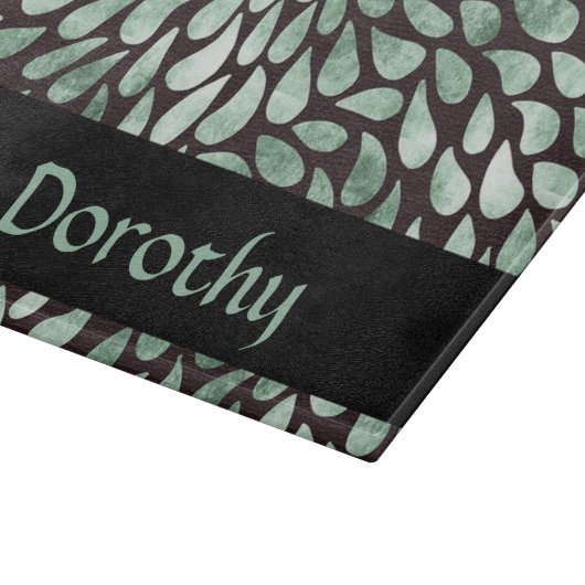 Gradiënt groene bloemblaadjes op zwart snijplank (Hoek)