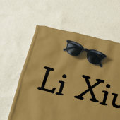 Grand Asiatique de serviette de plage de symbole (En situation)