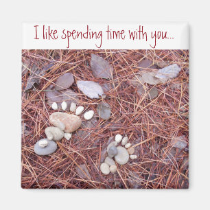 Grand et petit aimant d'empreinte de pas