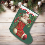 Grande Chaussette De Noël Cute Peeking Santa Claus<br><div class="desc">Nous savons tous que le Père Noël est magique (n'est-ce pas ? !), il ne devrait donc pas être surprenant qu'il puisse se cacher dans une réserve de Noël ! Le voici, en regardant d'un bas orné qui est rempli de baies saintes, rouges et de fleurs de poinsettia. Je parie...</div>