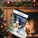 Grande Chaussette De Noël Guitare Snowman Personnalisée<br><div class="desc">Apportez votre joie de vacances à votre maison avec notre Snowman Guitar Large Christmas Stocking! Idéal pour les cadeaux et les gourmandises, c’est un joli complément à vos festivités. Personnalisez avec ce nom spécial et cette année pour un souvenir merveilleux! Des designs exclusifs créés pour vous par My Baby Boutique...</div>