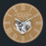 Grande Horloge Ronde 8th Bronze wedanniversary custom photo heart<br><div class="desc">Bronze heart wedanniversclock personalize with your own couples, year of marriage, and names or relationship to you. The example reads Belinda & James Thompson 8e Bronze Wedding Anniversary and your marriage and current date. Other matching eight years married wedding anniversary heart toxits and cards are available. Precious metal bronze heart...</div>
