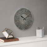 Grande Horloge Ronde Ancient Infinite Weave Celtic Stone Wall Clock<br><div class="desc">Bring the timeless power of ancient history into your home. The Infinite Weave Wall Clock features a seamless, circular Celtic knotwork pattern deeply etched into a distressed stone-like texture, inspired by the mysterious megaliths and standing stones found across Ireland and Scotland. This isn't just a clock; it’s a functional piece...</div>