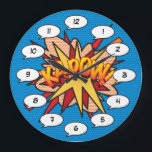 Grande Horloge Ronde Bande dessinée Pop Art KA-POW<br><div class="desc">Des horloges pop comic super-héros branchées qui ajouteront une touche de couleur à une gamme de pièces autour de votre maison ou bureau. Une façon idéale de vous offrir ou de traiter quelqu'un que vous connaissez avec ces horloges de dessinateur de bande dessinée cool et unique. Pourquoi ne pas ajouter...</div>
