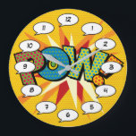 Grande Horloge Ronde Bande dessinée Pop Art POW<br><div class="desc">Des horloges de bande dessinée de super-héros tendance et amusantes qui sont sûres d'ajouter une touche de couleur dans une gamme de pièces autour de votre maison ou de votre bureau. Un moyen idéal de vous faire plaisir ou de faire plaisir à quelqu'un que vous connaissez avec ces horloges de...</div>