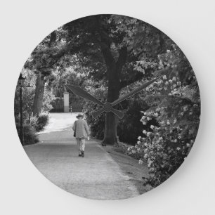 Grande Horloge Ronde Black and white photo of old man at park