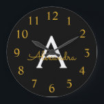 Grande Horloge Ronde Black Gold Modern Script Girl Monogramme Nom<br><div class="desc">Black and Gold Simple Script Monogram Clock. This makes the perfect sweet 16 birthday,  wedding,  bridal shower,  anniversary,  baby shower or bachelorette party gift for someone that loves glam luxury and chic styles.</div>