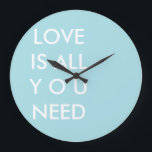 Grande Horloge Ronde Blue Love is All You Need Custom White Text<br><div class="desc">Blue and white "All you need is love" custom text template personalized round wall clock with quotes. Custom typographiy wall clock template, by red_dress, featuring the white text "Love is All you Need" on a blue customizable background. Easily personalize writa text wall with your favorite colors and quotes. click the...</div>