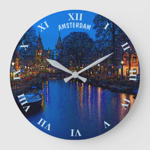 Grande Horloge Ronde Canal romantique d'Amsterdam la nuit avec des