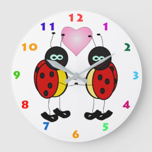 GRANDE HORLOGE RONDE DEUX COCCINELLES MIGNONNES ET UN CŒUR ROSE POUR LE