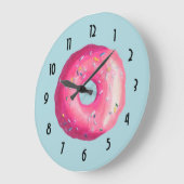 Grande Horloge Ronde Donut With Pink Frosting And Sprinkles (Angle)