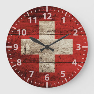 Grande Horloge Ronde Drapeau de la Suisse sur le vieux grain en bois