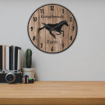 Grande Horloge Ronde Farm Ranch ou Stable Name 7 Custom Barnwood Styled<br><div class="desc">Personalize this custom barnwood styled clock with your farm,  ranch,  or stable name to add a personal touch to the decor. Brown barnwood look clock face with galloping horse silhouette in center. Choose one of two sizes and two colors of clock hand,  whichever is to your liking.</div>