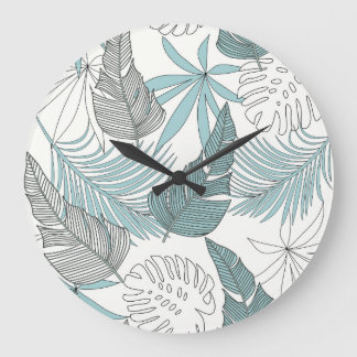 Grande Horloge Ronde Feuilles tropicaux : une tendance transparente