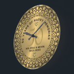 Grande Horloge Ronde Mandala noir sur l'or 50ème anniversaire mariage<br><div class="desc">Cercle de mandala orné noir sur les tons or arrière - plan,  personnalisable mariage or Anniversaire. Célébration de 50 ans de bons souvenirs texte personnalisable.</div>