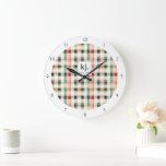 Grande Horloge Ronde Monogramme En vichy doux À feuillage persistant<br><div class="desc">Élevez votre décor de maison avec une touche de charme intemporel en utilisant la En vichy moelleuse Monogram Large Clock. Dotée d'une en vichy classique dans les tons doux à feuillage persistant, rouges et crème, cette horloge élégante allie à merveille élégance rustique et modernité. Le monogramme personnalisable au centre vous...</div>