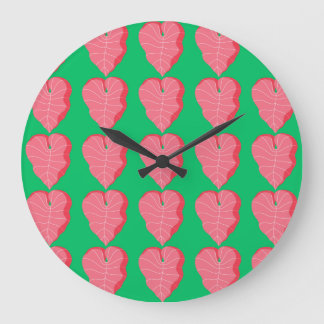 Grande Horloge Ronde Motif feuille coloré sur Arrière - plan vert