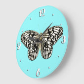 Grande Horloge Ronde Papillon noir et blanc, arrière - plan turquoise (Angle)