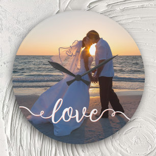 Grande Horloge Ronde Photo de mariage sur la plage au coucher du soleil