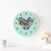 Grande Horloge Ronde Plumes dans une conception d'aquarelle de forme de (Maison)