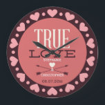 Grande Horloge Ronde Poison de True Love Wedding<br><div class="desc">Personalized custom wall clock wedding venin / favor with a cute True Love typology text designtor illustration. An adorable, stylish badge with a border of love hearts in pink and white colors on a brown background. Chic, classy, romantic custom venin pour la bride et le groom on their wedding day....</div>