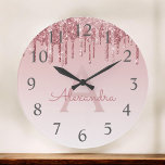 Grande Horloge Ronde Rose Gold Sparkle Glitter Monogram Name & Initial<br><div class="desc">Blush Pink - Rose Gold Ombre Dripping Sparkle Glitter Monogram Name and Initial Serving Wall Clock. The Wall Clock makes the perfect gift for someone who loves pink sparkle glitter.</div>