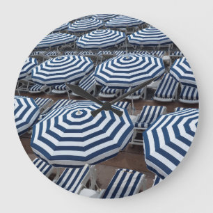 Grande Horloge Ronde Rows of Striped Beach Umbrellas With Sun Beds