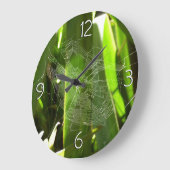 Grande Horloge Ronde Spiderweb dans Tropical Leaves Nature (Angle)