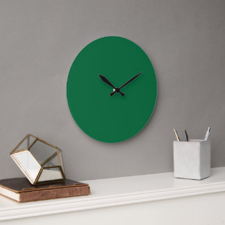 Grande Horloge Ronde Un arrière - plan vert profond contrasté par un bl