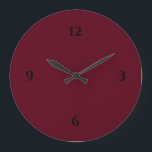 Grande Horloge Ronde Vin bordeaux simple et noir<br><div class="desc">L'horloge moderne présente un design minimaliste dans une palette de couleurs bordeaux aux accents noirs. Un design simple et épuré avec des chiffres noirs sur un arrière - plan bordeaux couleur vin. Un ajout branché à votre cuisine, salon ou mur de bureau, un cadeau de bureau moderne réfléchi ou un...</div>