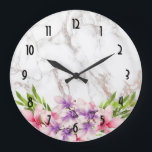 Grande Horloge Ronde Watercolor Magnolias on Faux Marble Texture<br><div class="desc">A modern classy clock with an elegant design - a faux marble texture in white makes up the background. Large pink and purple watercolor magnolia flowers with green leafy accents decorate the design along the bottom.</div>