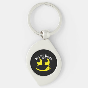 Grappig Geel Smiley Gezicht op Zwarte Metaal Sleutelhanger