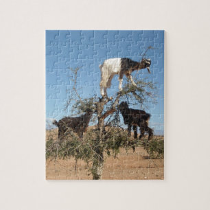 Grappig geit in een boom legpuzzel