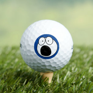 Grappig golfbal: Verschrikt humoristisch gezicht Golfballen