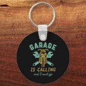 Grappig motorfietsmechanisme dat de garage noemt sleutelhanger (Voorkant)