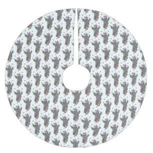 Grappig schattige neushoorns over eenwieler kerstboom rok